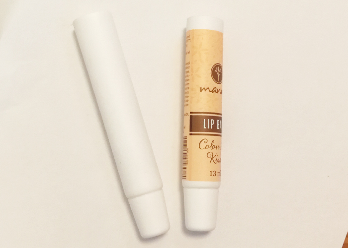 lip balm tube in solid black color with customized printing content